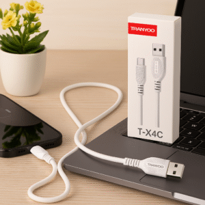 کابل شارژ ترانیو X4-C و جعبه آن روی میز کار